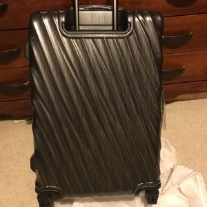 tumi 19 degree polycarbonate discontinued